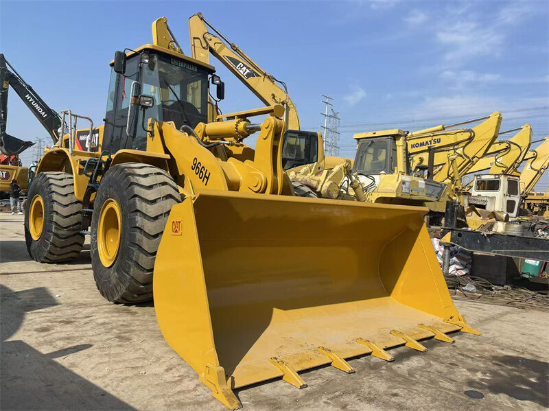 Máy tải bánh xe CAT 966H cũ với động cơ Weichai 23698kgs Trọng lượng hoạt động và dung lượng xô 4,0m3